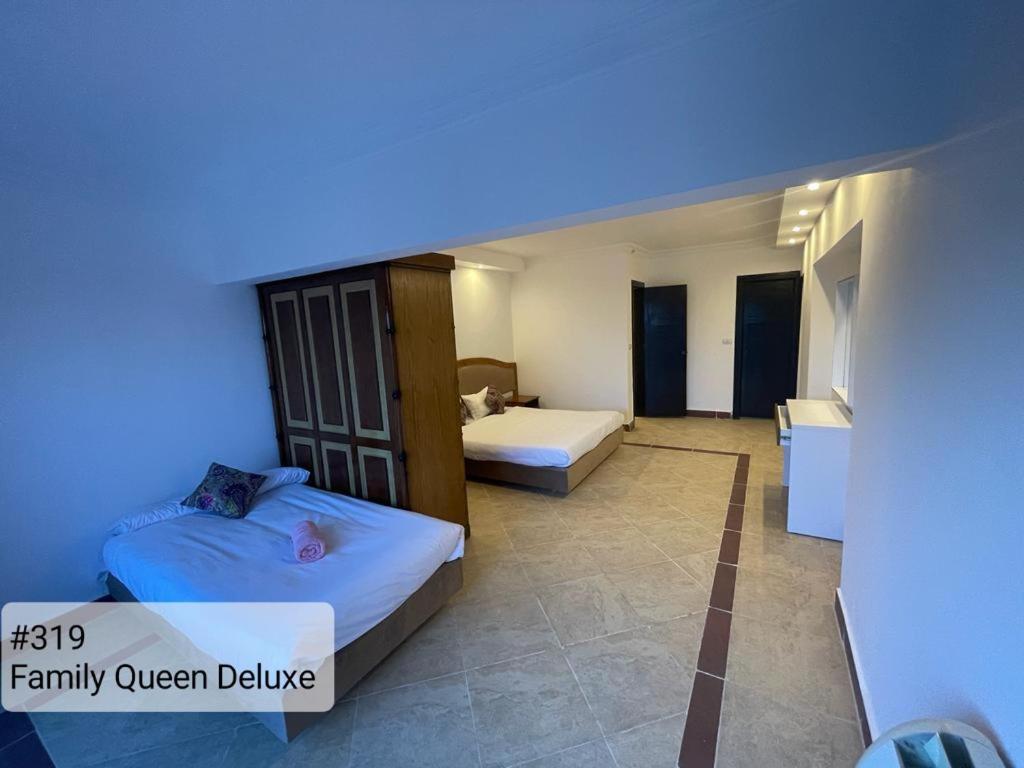Alia Beach Residence Hurghada Chambre photo